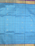 Uppada seiko pattu saree sky blue color allover checks, motifs & zari border with contrast pallu and plain blouse