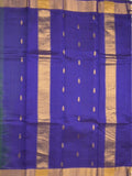 Uppada seiko pattu saree bottle green color allover checks, motifs & zari border with contrast pallu and plain blouse