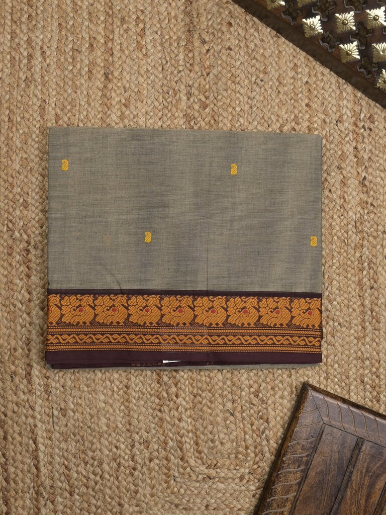 Kanchi cotton saree allover motifs with contrast border and attached self blouse