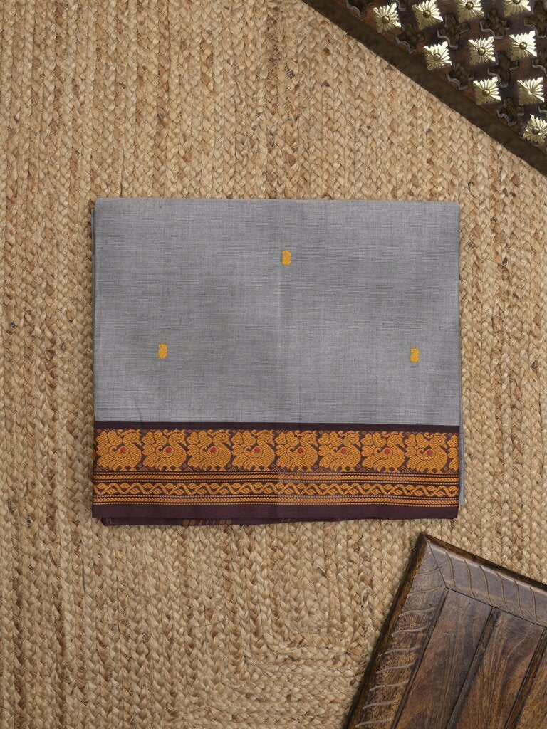 Kanchi cotton saree allover motifs with contrast border and attached self blouse