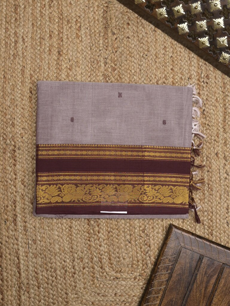 Kanchi cotton saree allover motifs with contrast border and attached self blouse
