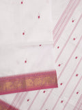 Kanchi cotton saree allover motifs and zari border with attached self-blouse