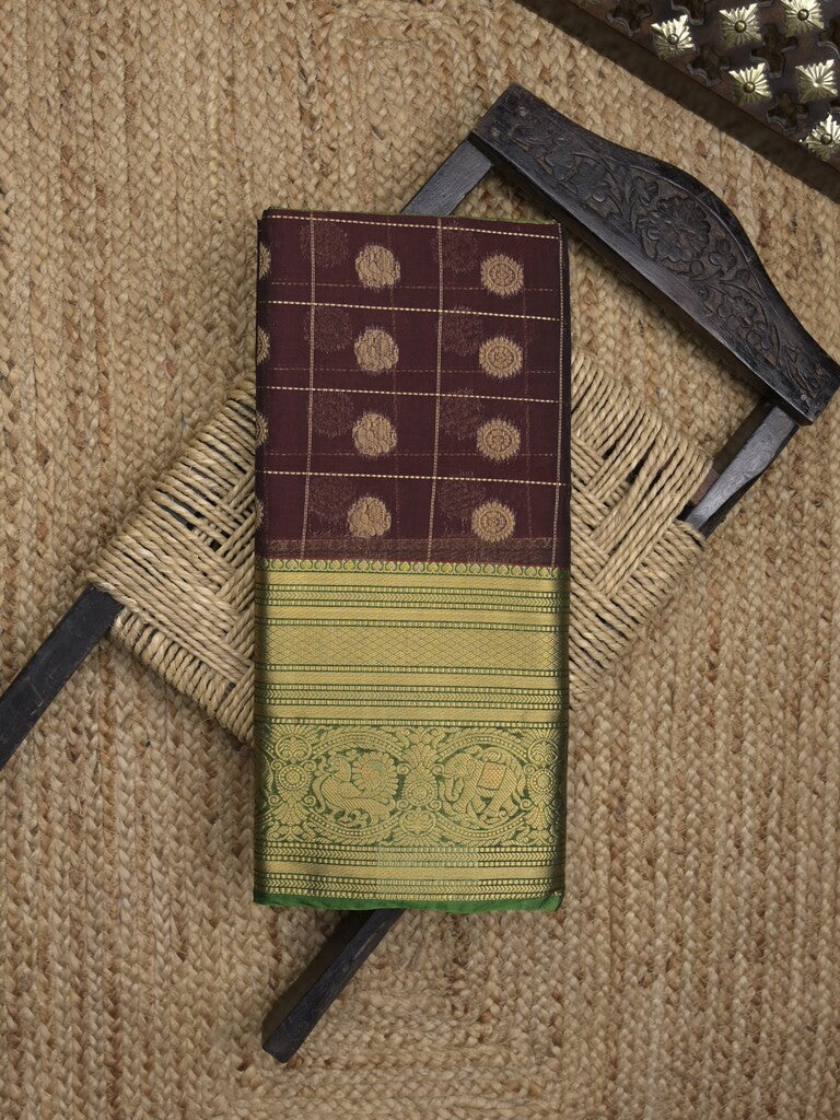 Seiko Raga zari-woven saree in dark brown color with zari border and rich pallu & contrast blouse