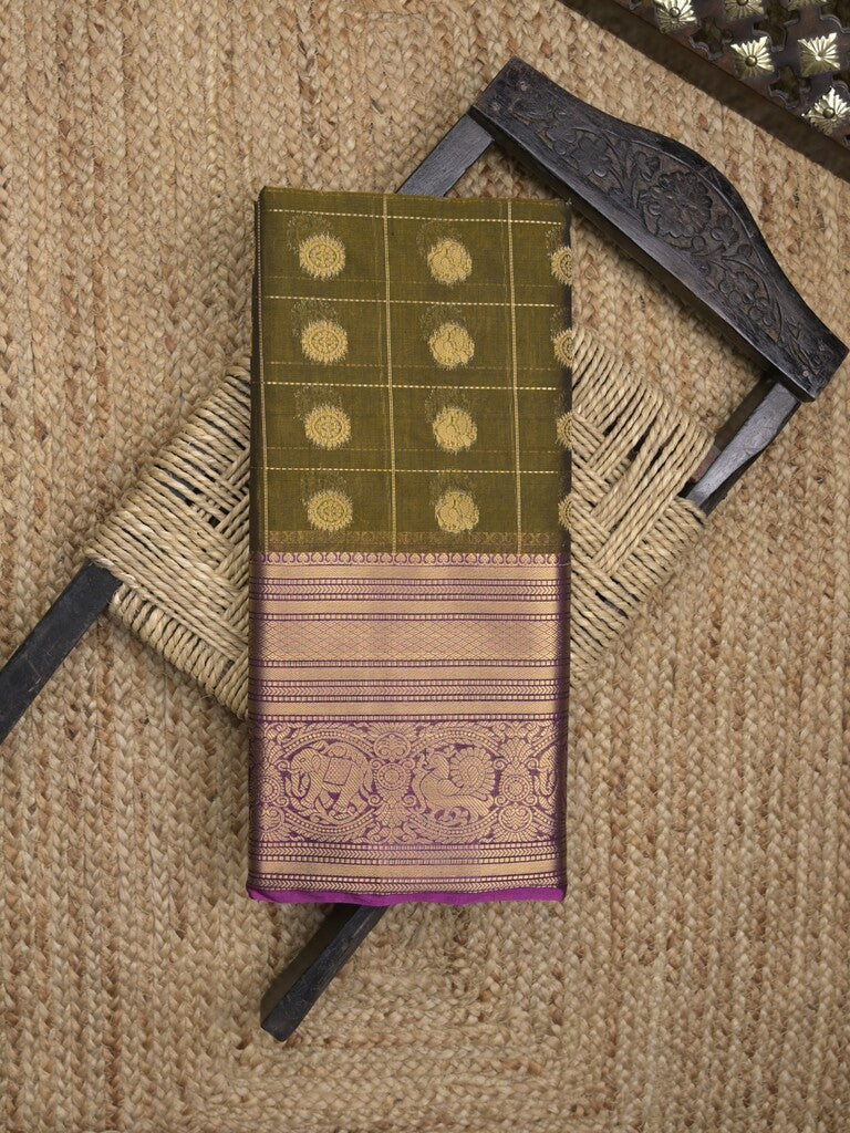 Seiko Raga zari-woven saree in olive green color with zari border and rich pallu & contrast blouse