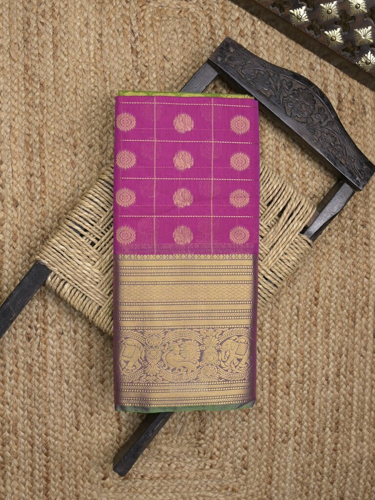 Seiko Raga zari-woven saree in magenta color with zari border and rich pallu & contrast blouse