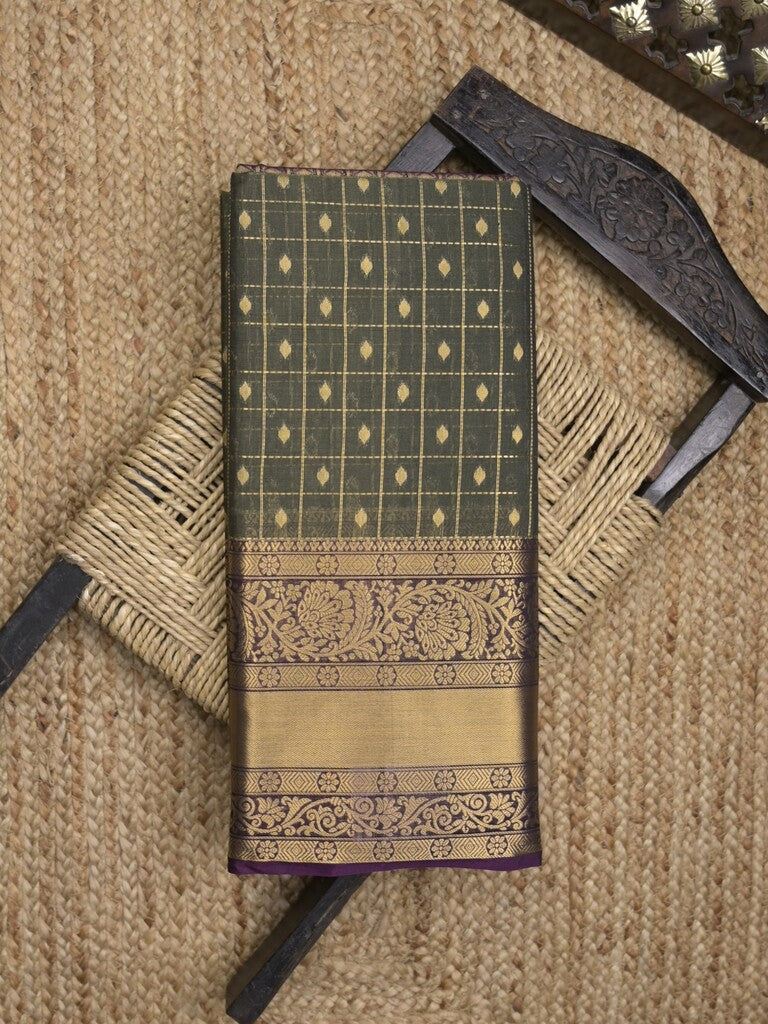 Seiko Raga zari-woven saree in dark green color with zari border and rich pallu & contrast blouse