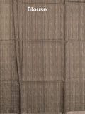 Tussar fancy saree grey color allover prints & small kaddi border with short printed pallu and attached blouse