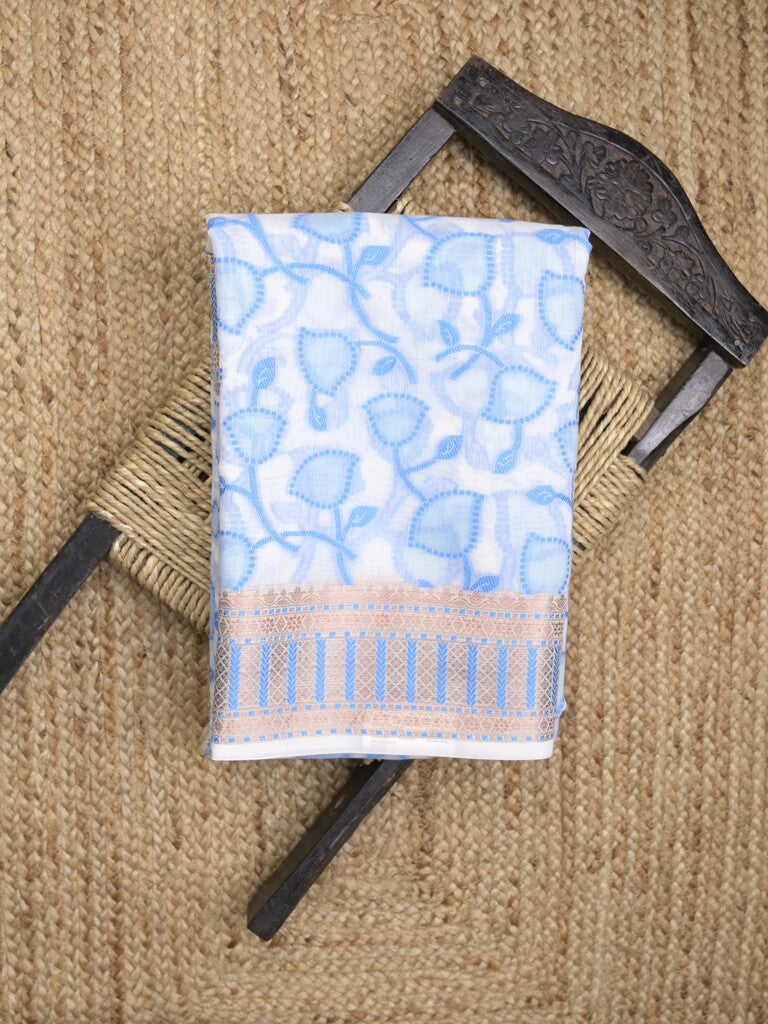 Chanderi fancy saree in white color with allover weaves and zari border with contrast pallu and blouse