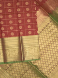 Seiko Raga zari-woven saree in maroon color with zari border and rich pallu & contrast blouse