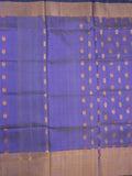 Uppada pattu saree peacock blue color allover zari motifs & long kaddi border with rich pallu and contrast plain blouse