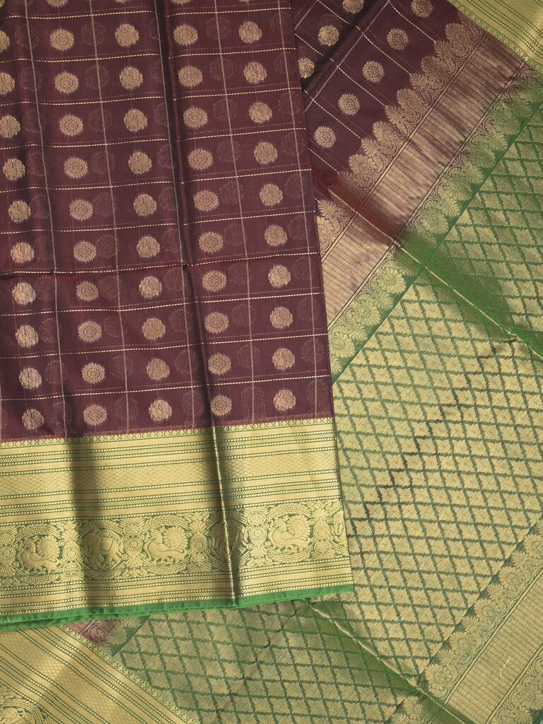 Seiko Raga zari-woven saree in dark brown color with zari border and rich pallu & contrast blouse