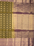Seiko Raga zari-woven saree in olive green color with zari border and rich pallu & contrast blouse