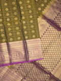 Seiko Raga zari-woven saree in olive green color with zari border and rich pallu & contrast blouse