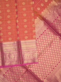 Seiko Raga zari-woven saree in coral pink color with zari border and rich pallu & contrast blouse