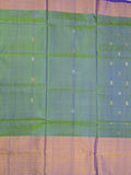 Uppada pattu saree peacock green color allover zari motifs & long kaddi border with rich pallu and contrast plain blouse