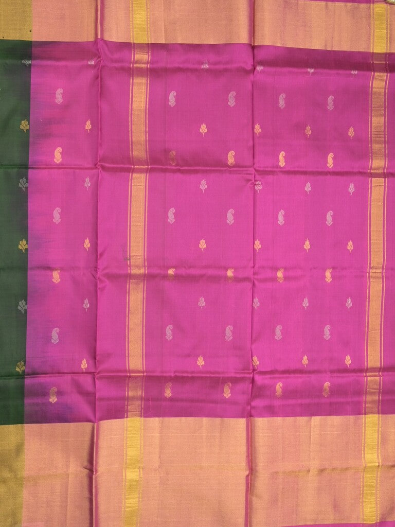 Uppada pattu saree bottle green color allover zari motifs & long kaddi border with rich pallu and contrast plain blouse