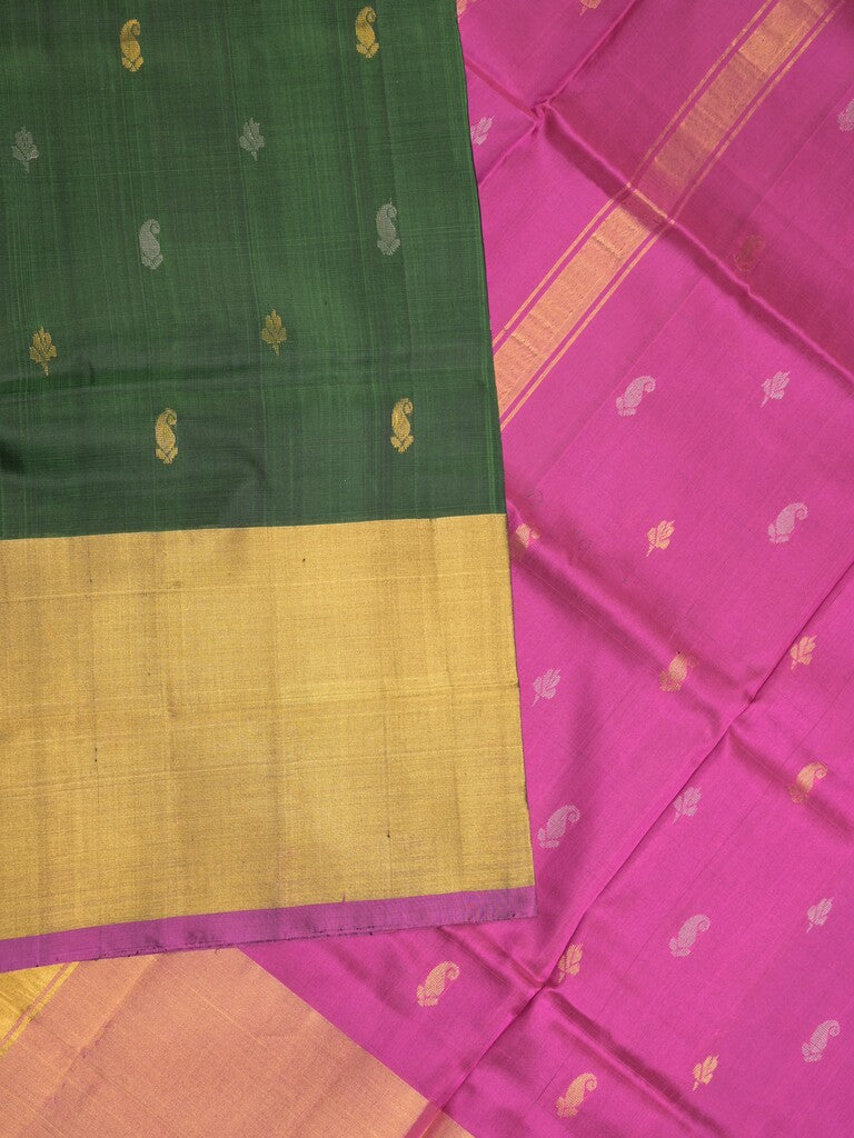Uppada pattu saree bottle green color allover zari motifs & long kaddi border with rich pallu and contrast plain blouse