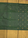 Uppada pattu saree bottle green color allover zari motifs & long kaddi border with rich pallu and contrast plain blouse