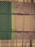 Seiko Raga zari-woven saree in bottle green color with zari border and rich pallu & contrast blouse