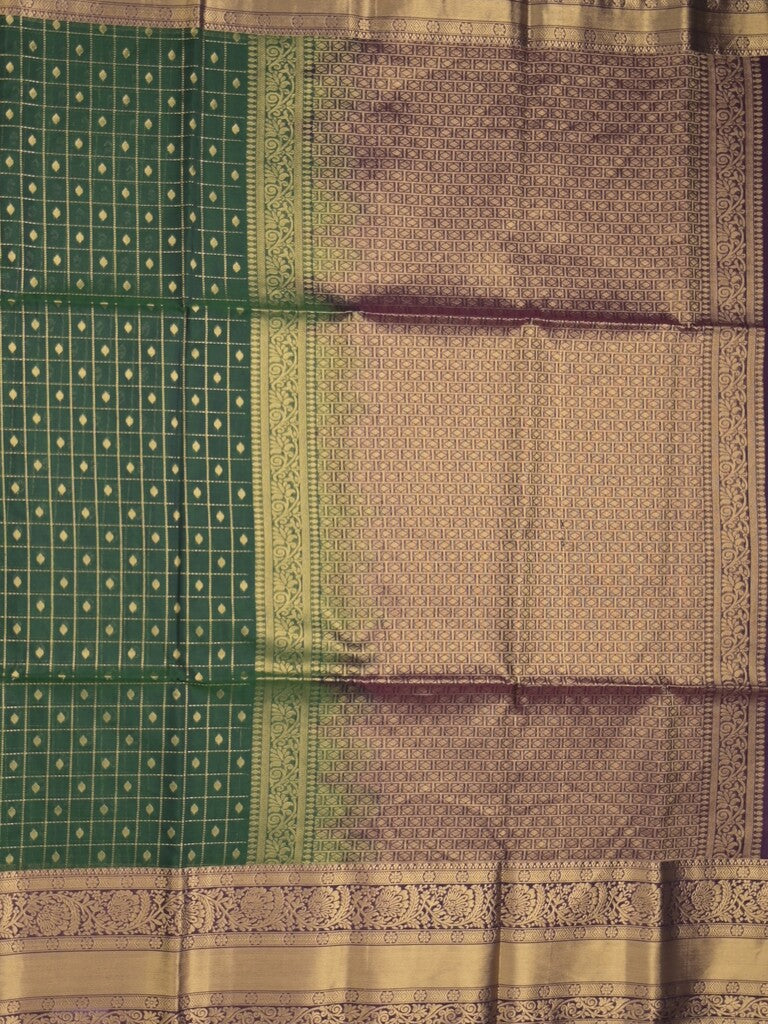 Seiko Raga zari-woven saree in bottle green color with zari border and rich pallu & contrast blouse