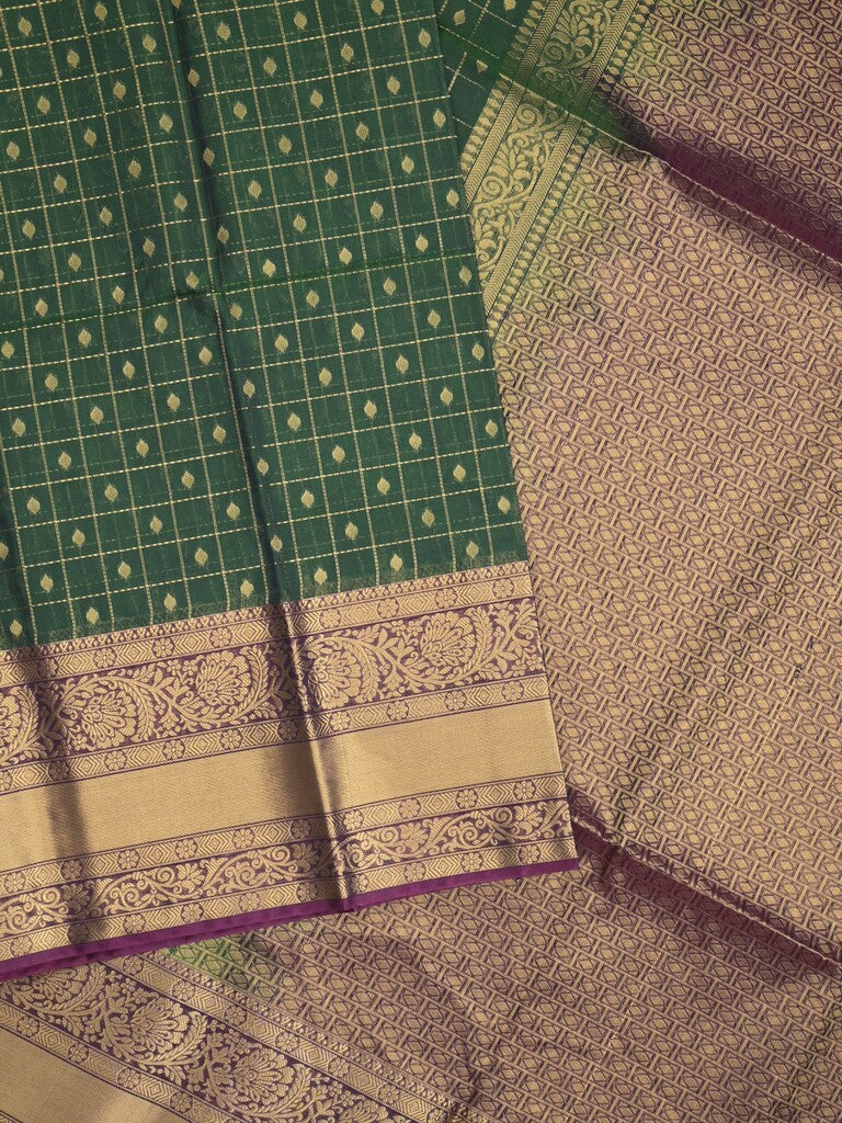Seiko Raga zari-woven saree in bottle green color with zari border and rich pallu & contrast blouse