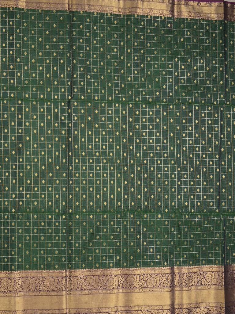 Seiko Raga zari-woven saree in bottle green color with zari border and rich pallu & contrast blouse