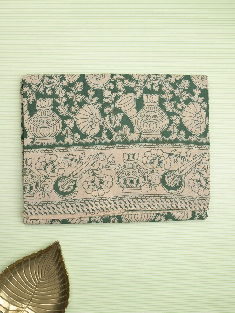 Kalamakari cotton saree green color allover prints & printed border with printed pallu and contrast blouse