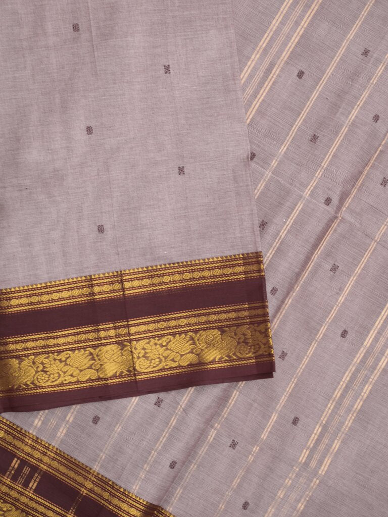 Kanchi cotton saree allover motifs with contrast border and attached self blouse