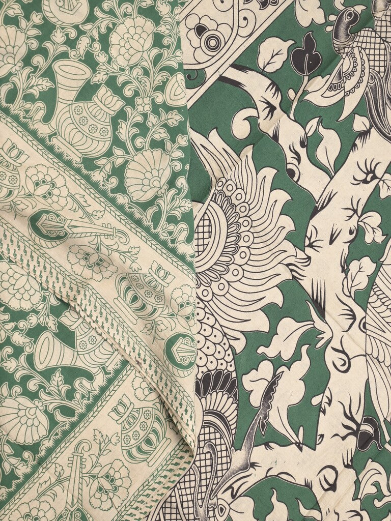 Kalamakari cotton saree green color allover prints & printed border with printed pallu and contrast blouse