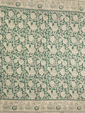 Kalamakari cotton saree green color allover prints & printed border with printed pallu and contrast blouse