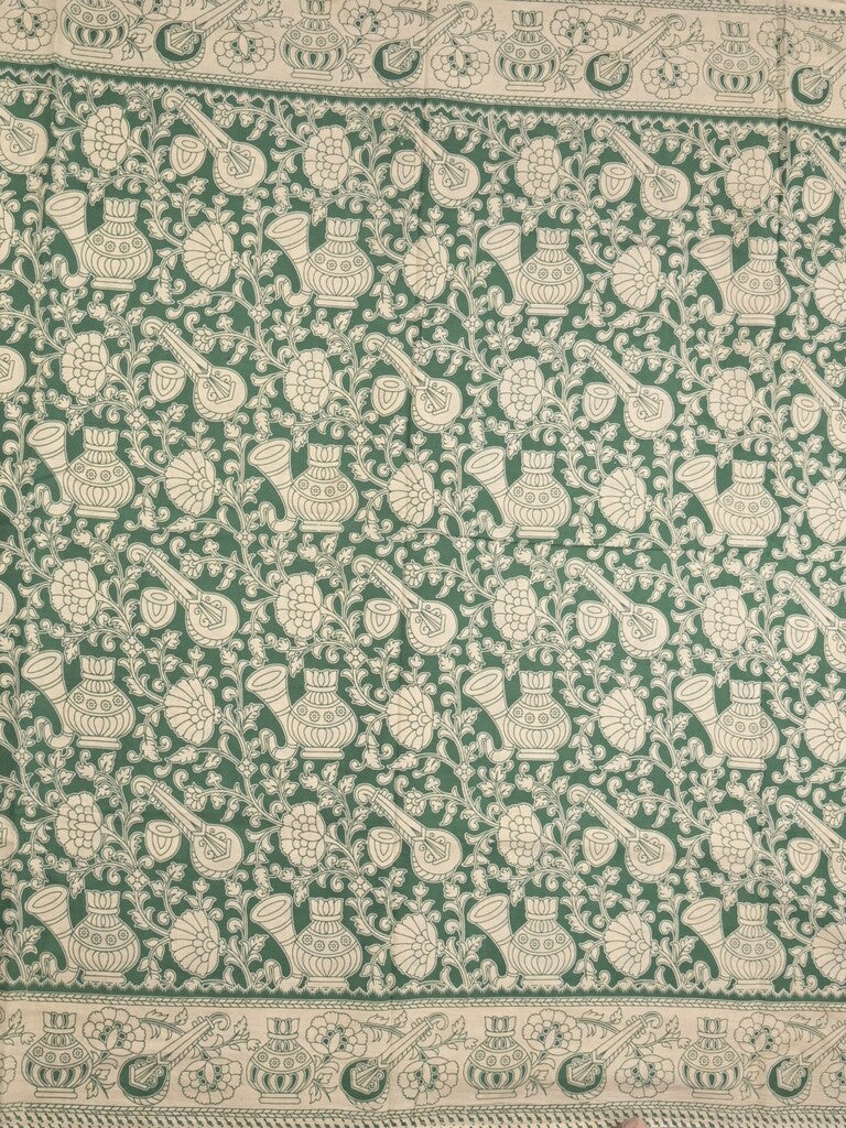 Kalamakari cotton saree green color allover prints & printed border with printed pallu and contrast blouse