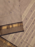 Kanchi cotton saree allover motifs with contrast border and attached self blouse