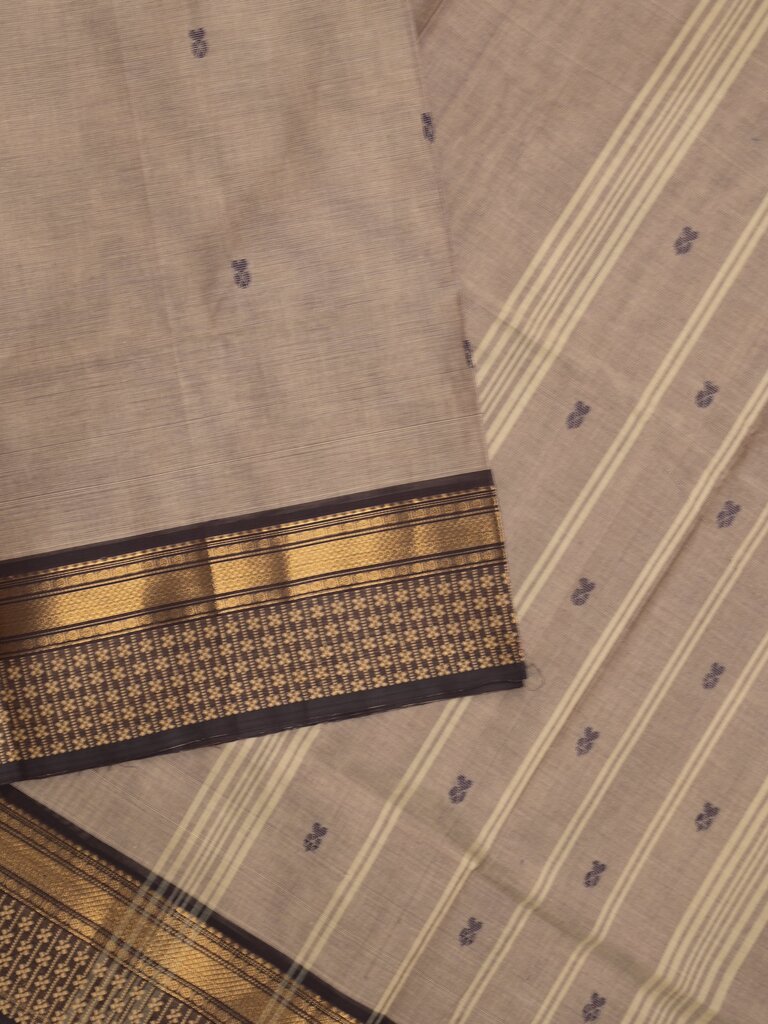 Kanchi cotton saree allover motifs with contrast border and attached self blouse
