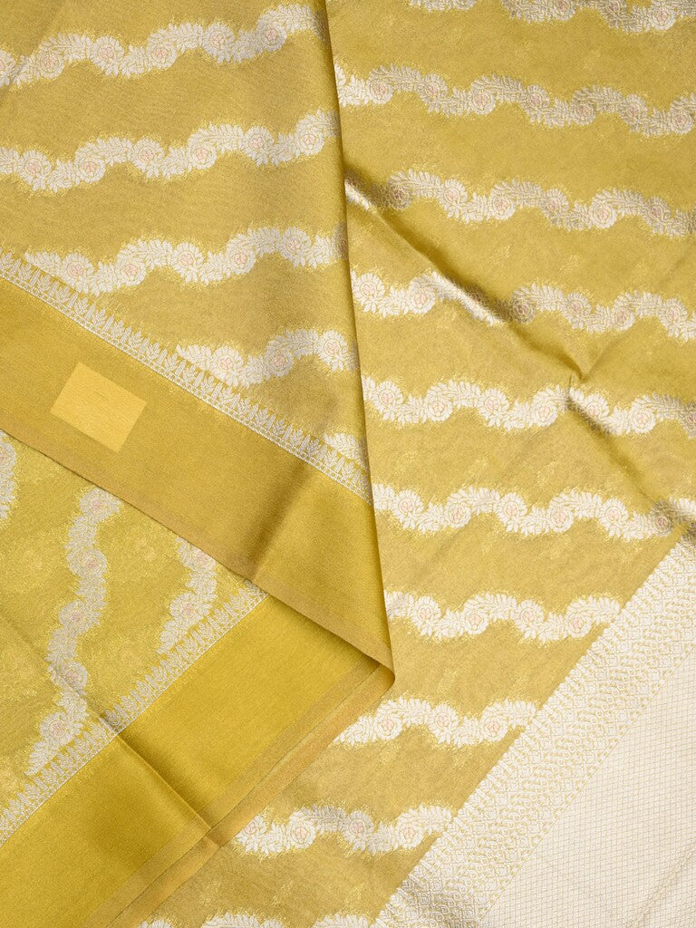 Organza tissue fancy saree golden yellow color allover stripes & small kaddi border with short pallu and attached blouse