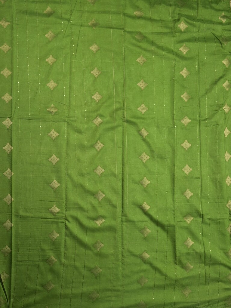 Dola silk fancy saree cream and green color allover prints & zari border with contrast pallu and attached blouse