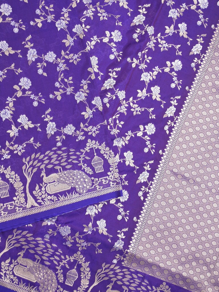 Raw mango fancy saree violet color allover zari weaves & zari border with zari border and attached plain blouse