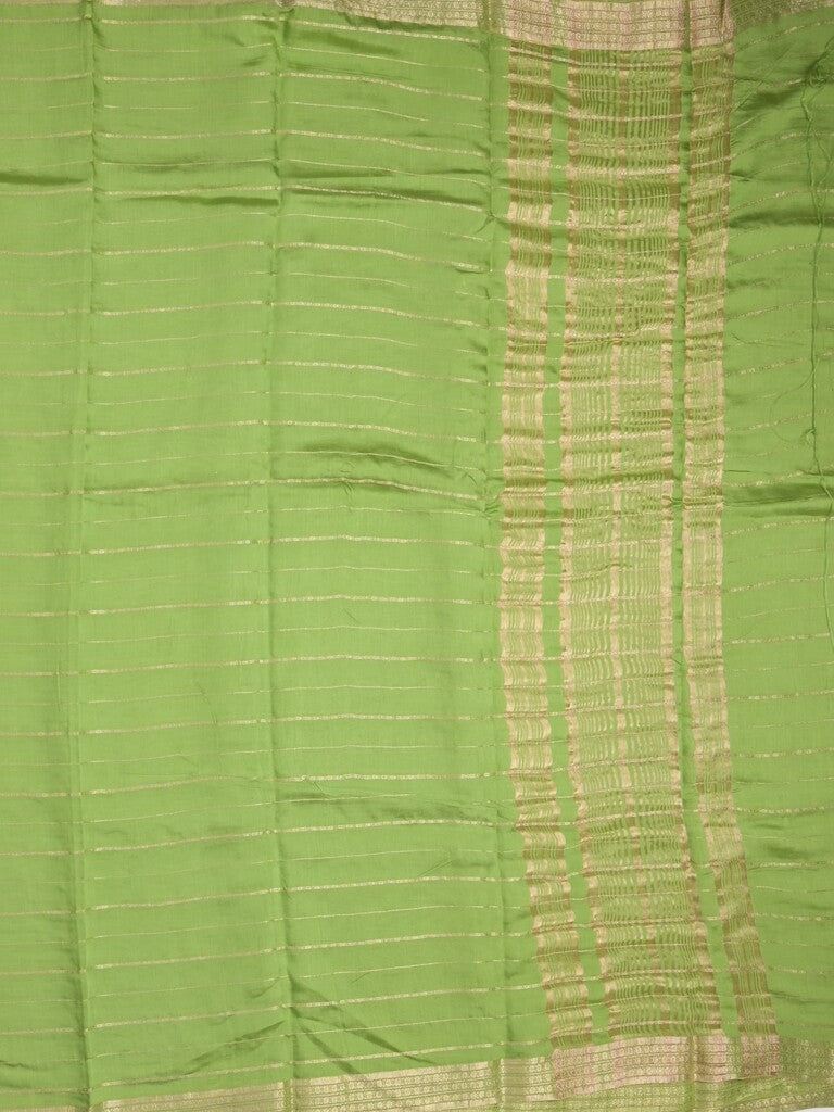 Dola silk fancy saree pista green color allover zari weaves & small kaddi border with short pallu and running blouse