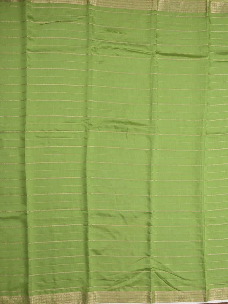 Dola silk fancy saree pista green color allover zari weaves & small kaddi border with short pallu and running blouse