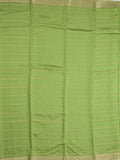 Dola silk fancy saree pista green color allover zari weaves & small kaddi border with short pallu and running blouse
