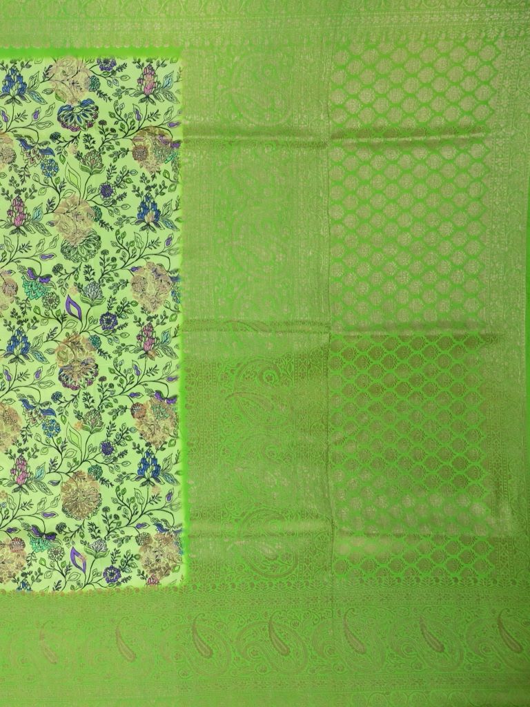 Dola silk fancy saree light green color allover prints & big zari border with rich pallu and plain contrast blouse