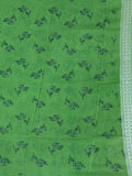 Dola silk fancy saree pista green color allover prints & zari border with short pallu and printed blouse