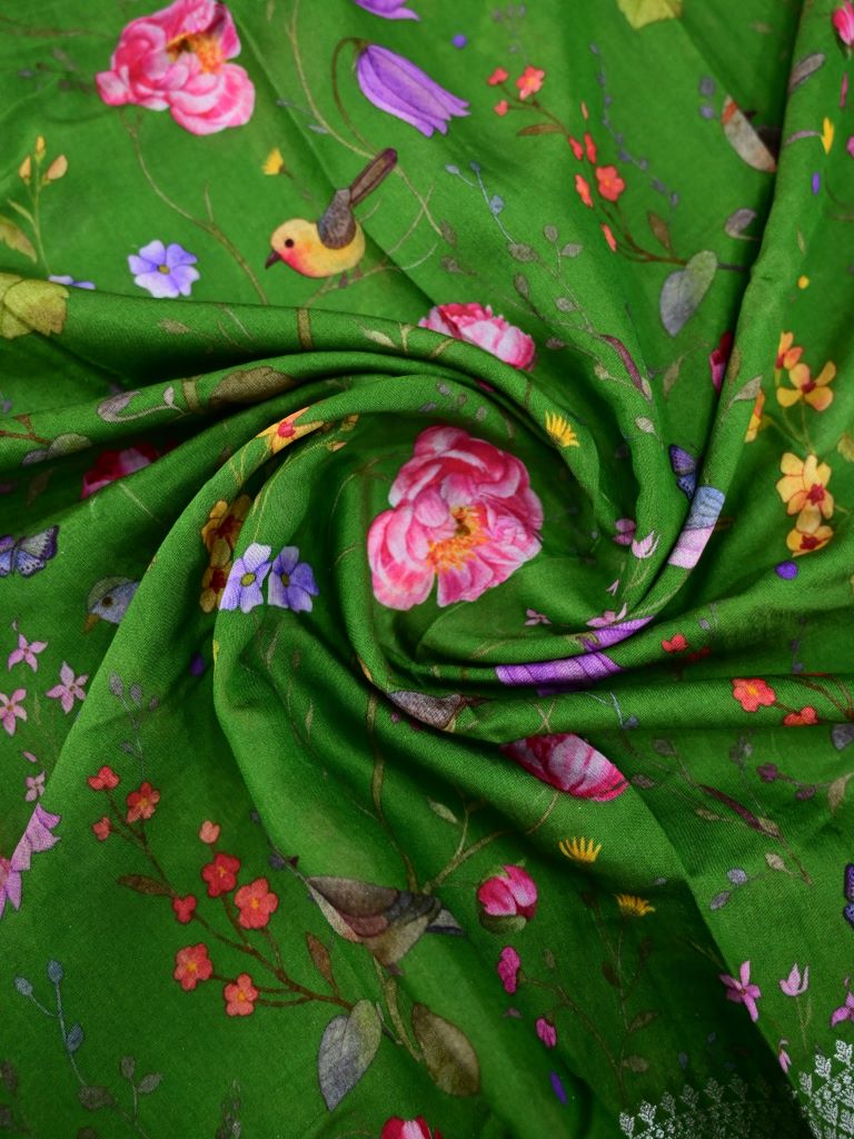 Munga fancy saree parrot green color allover prints & zari border with short pallu and printed blouse