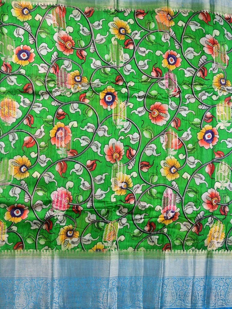 Jute matka fancy saree parrot green color allover prints & big zari border with short pallu and attached brocade blouse