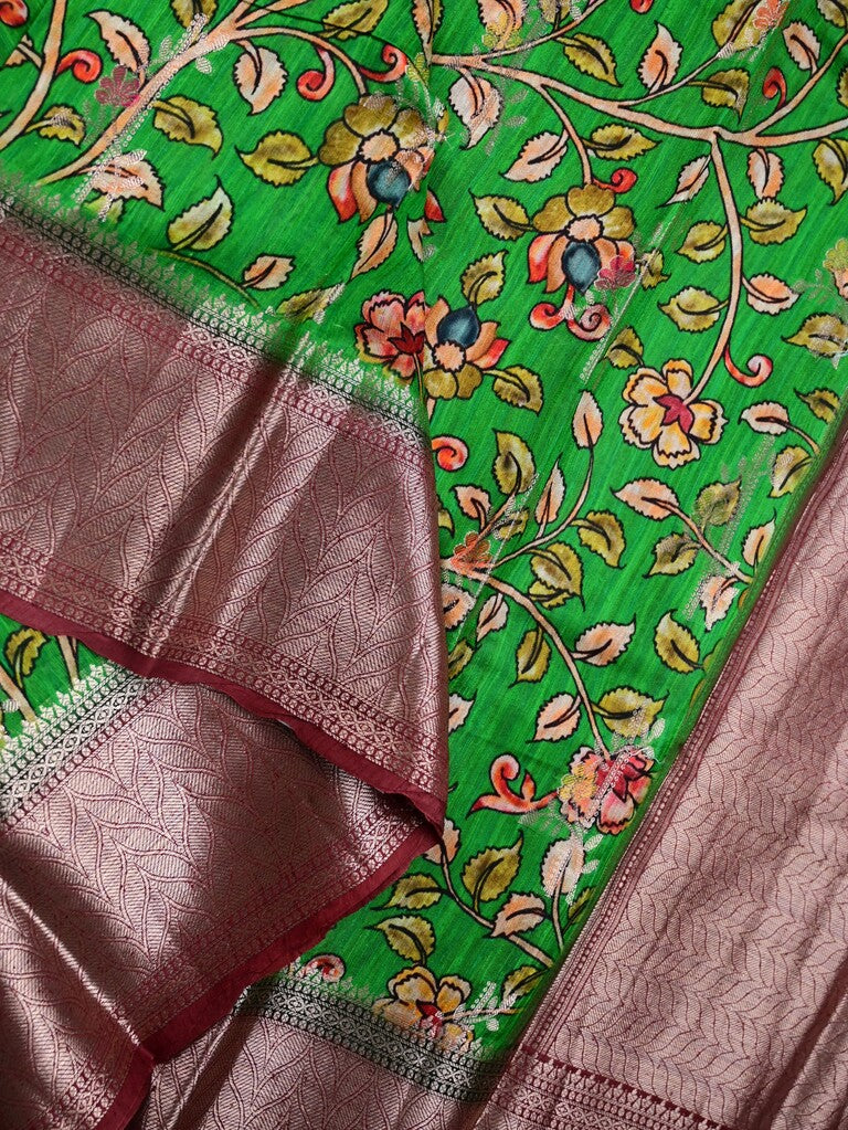 Jute matka fancy saree parrot green color allover prints & big zari border with short pallu and attached brocade blouse