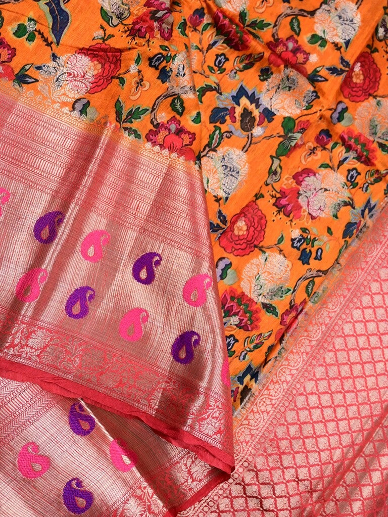 Jute matka fancy saree orange color allover prints & big zari border with short pallu and attached brocade blouse