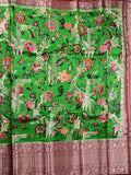 Jute matka fancy saree parrot green color allover prints & big zari border with short pallu and attached brocade blouse