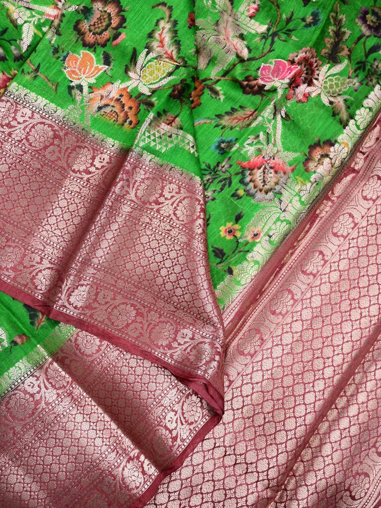 Jute matka fancy saree parrot green color allover prints & big zari border with short pallu and attached brocade blouse