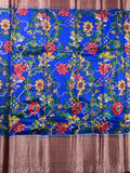 Jute matka fancy saree royal blue color allover prints & big zari border with short pallu and attached brocade blouse