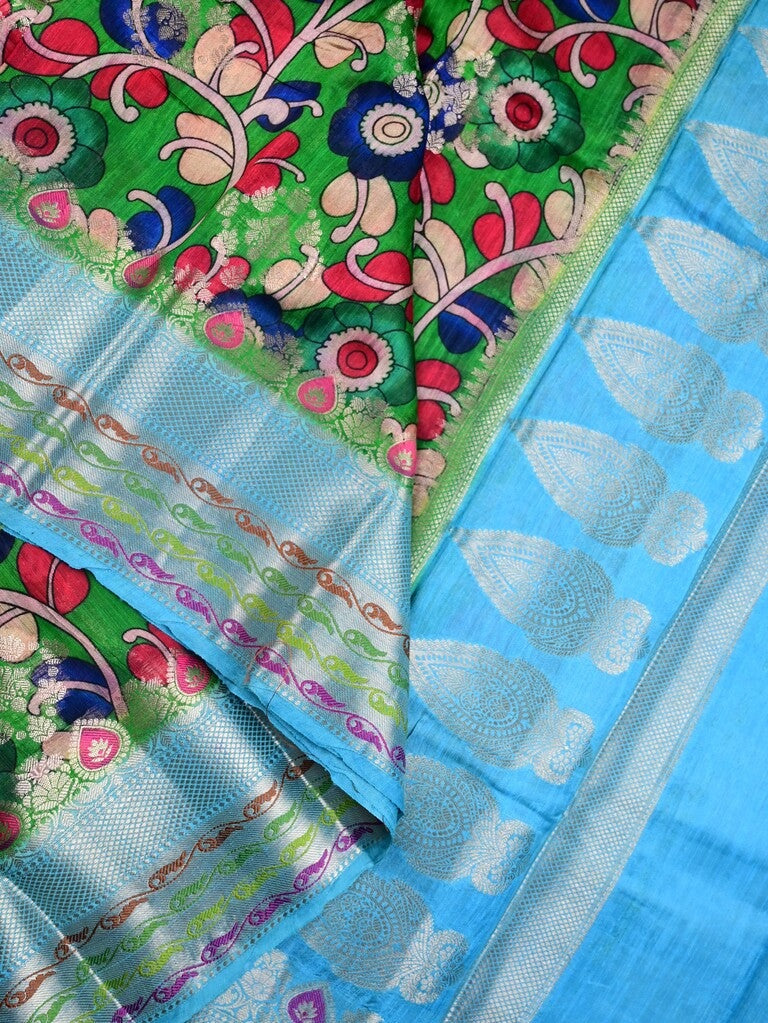 Jute matka fancy saree parrot green color allover prints & big zari border with short pallu and attached brocade blouse