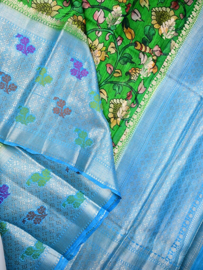 Jute matka fancy saree parrot green color allover prints & big zari border with short pallu and attached brocade blouse